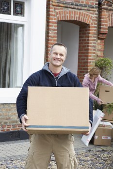 Staff sorting recyclable cardboard and packaging at Selfstorage Chiswick