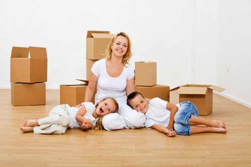 Fragile items being carefully wrapped by packing services in Chiswick