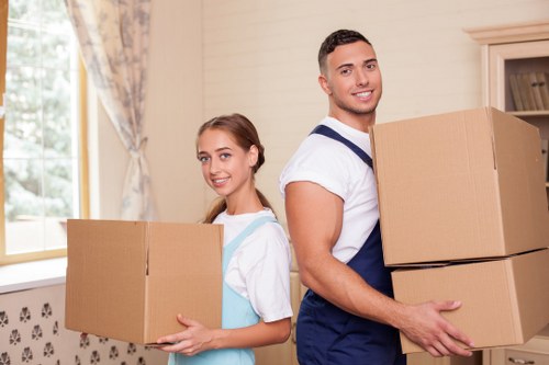 A moving team handling local removals in Chiswick on a residential street